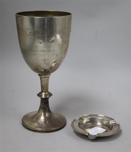 A Victorian silver cup(a.f.) and a silver ashtray.